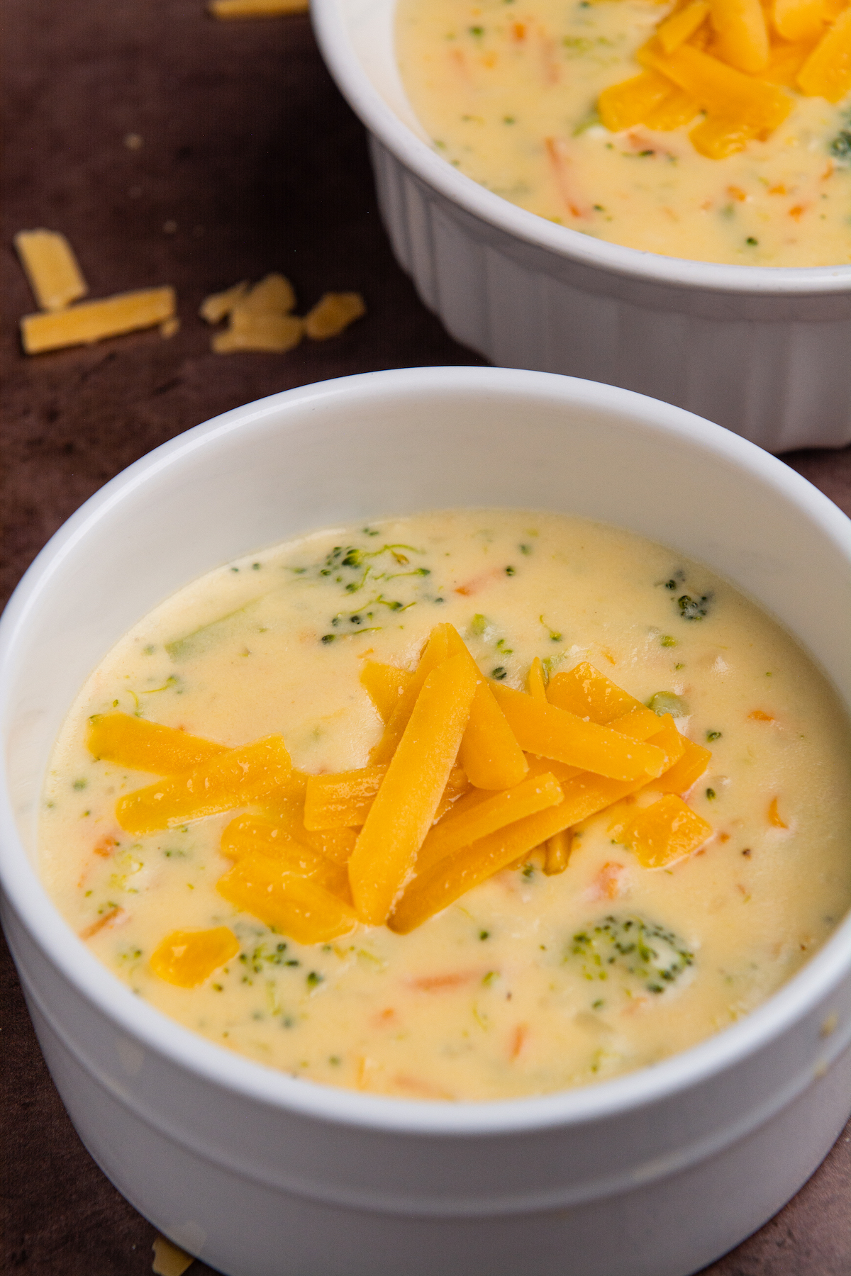 A bowl with broccoli cheddar soup.